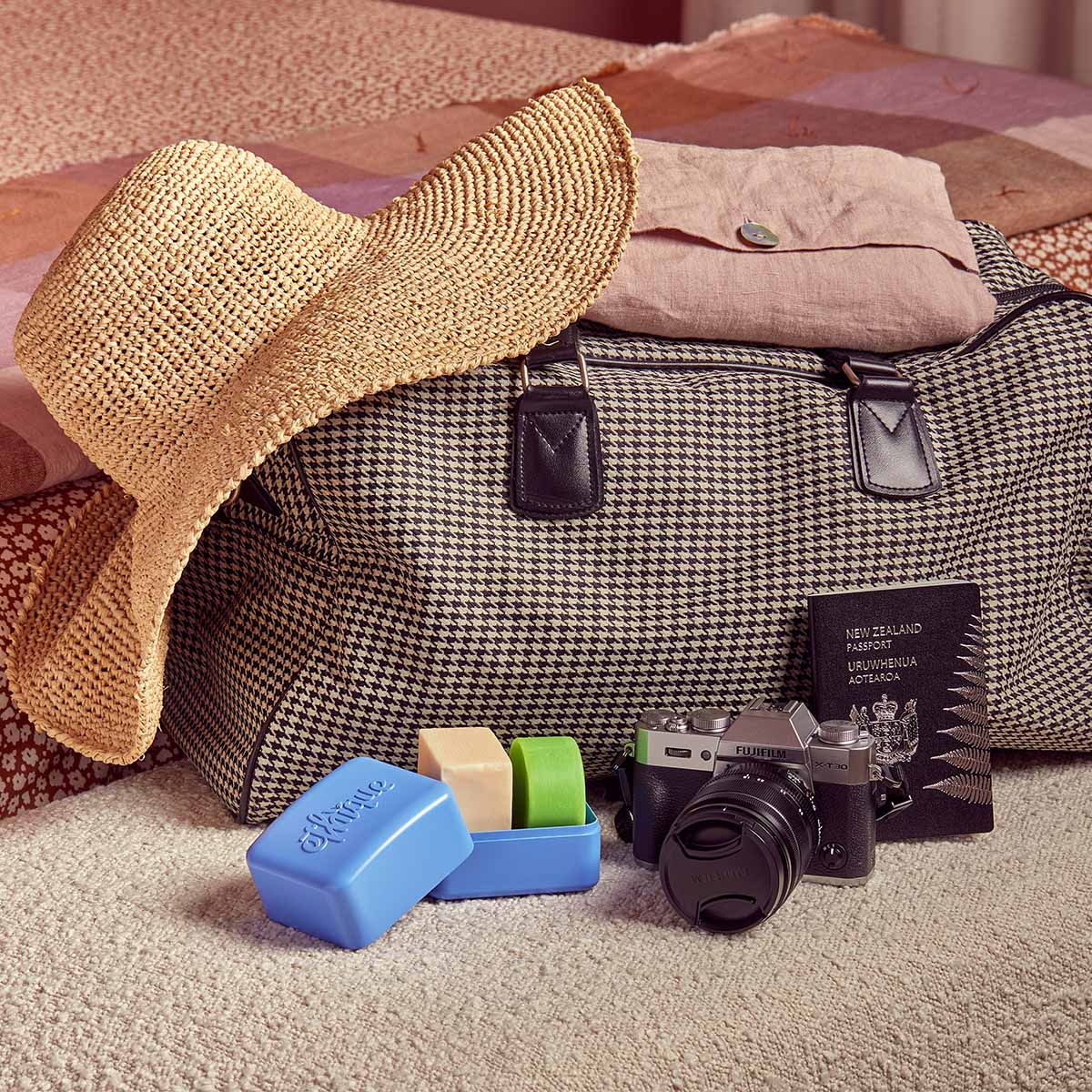 travel duffle with accessories and product