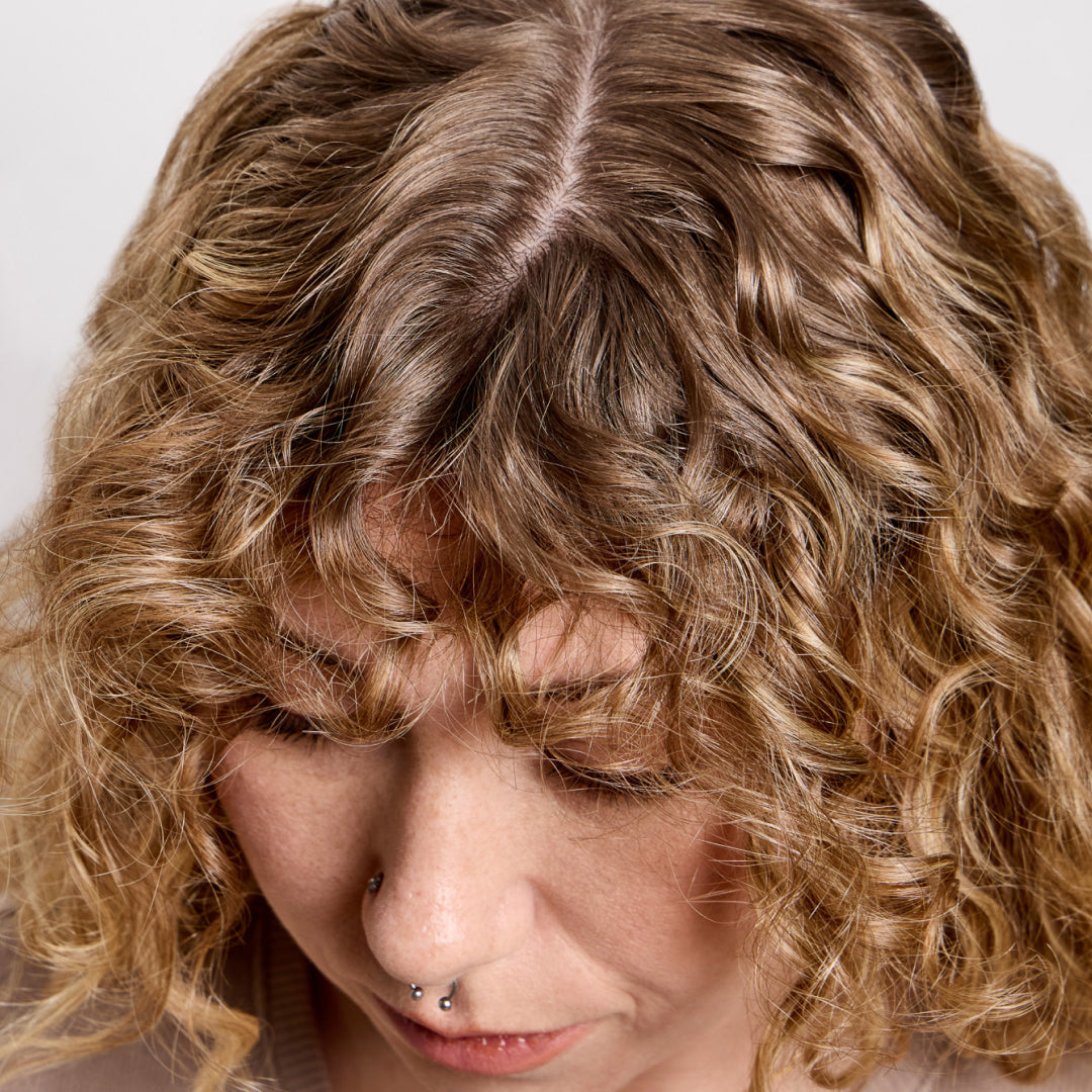 How to Sleep With Curly Hair: Tips for Defined, Frizz-Free Curls Overnight